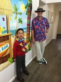 Scope Orthodontics Dr Peter Munt and kids on Hawaiian Day